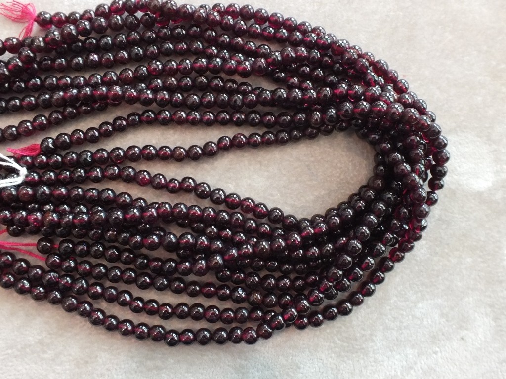 5.5-6 mm garnet strands, plain round almost 15 in long