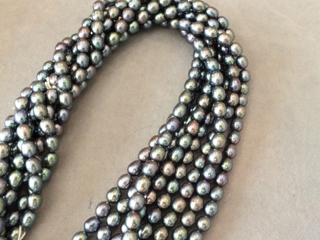 Grey oval shape fresh water pearl strands, 6.5-7 mm 