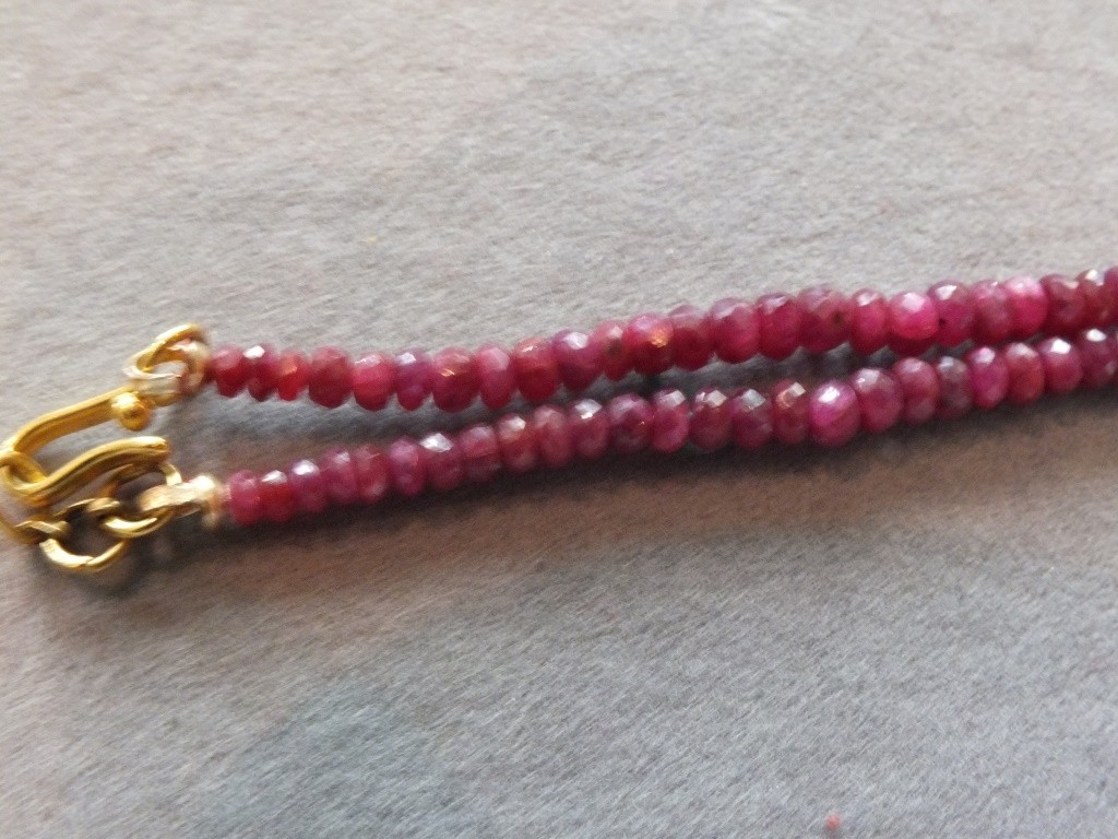 Graduated and faceted treated Ruby Necklace with pendant