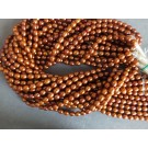 Fresh water pearls  strands {fwp},dyed-rust color