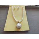 Fresh water pearls necklace and earrings with Mabe pendant